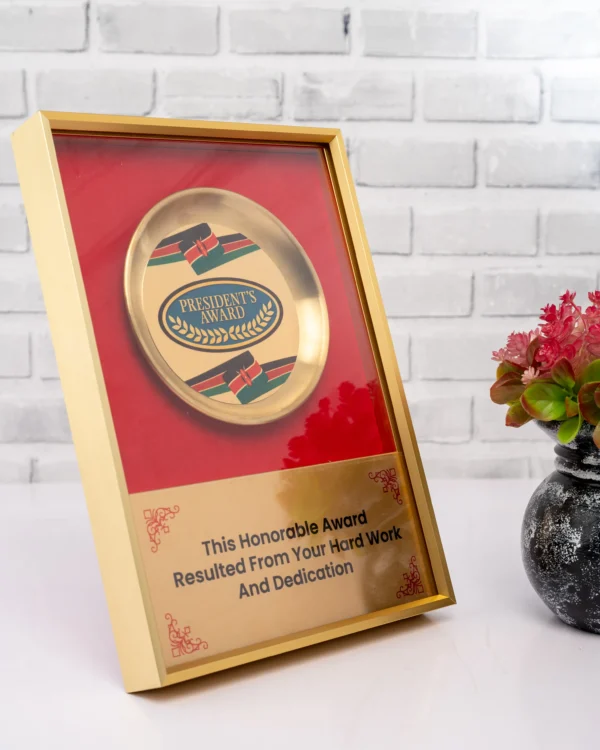 Gold Silver Medallion Award Plaque Red Grey Background Nairobi Call WhatsApp 0119383838 Credible Point
